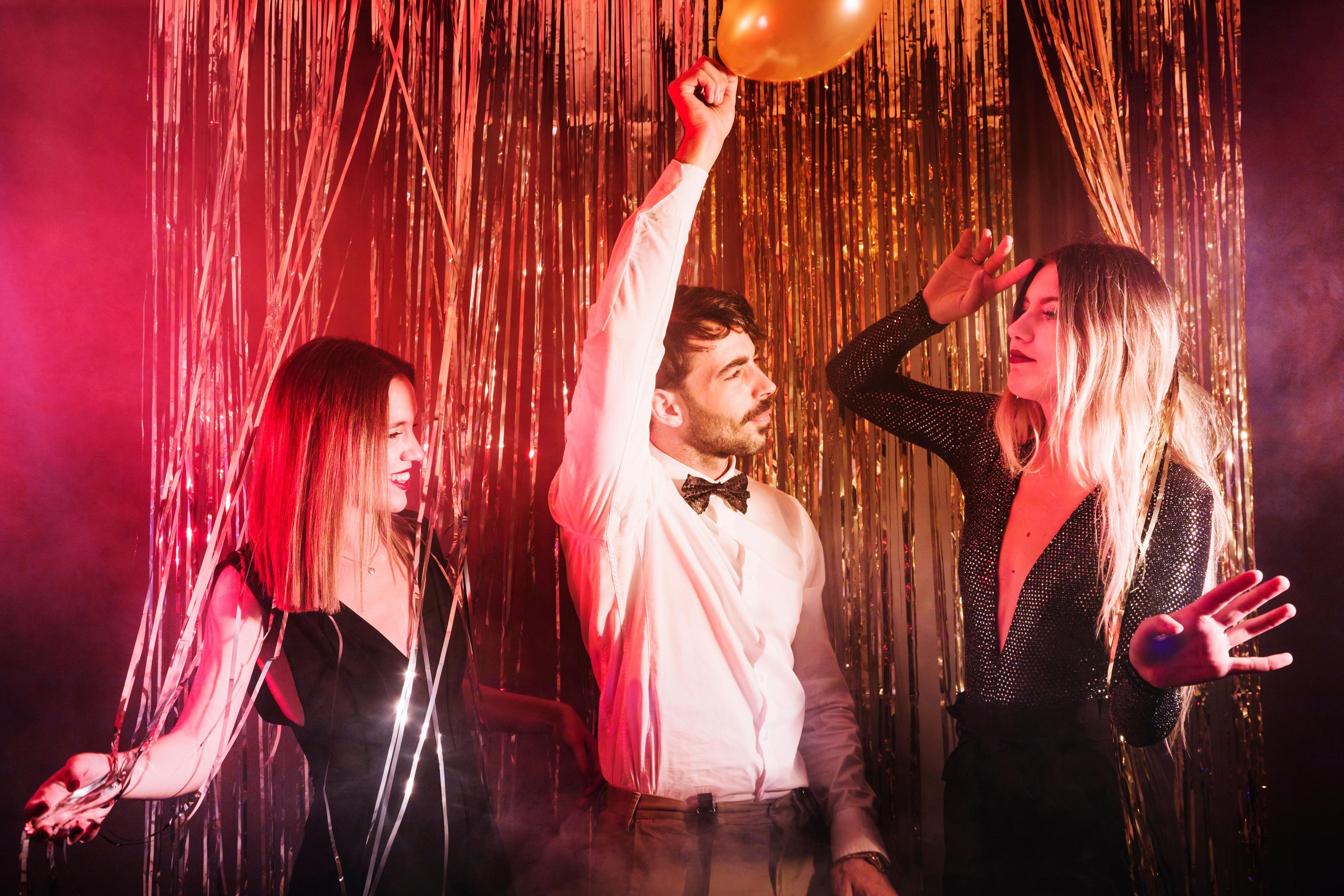 group-friends-dancing-new-year-party.jpg
