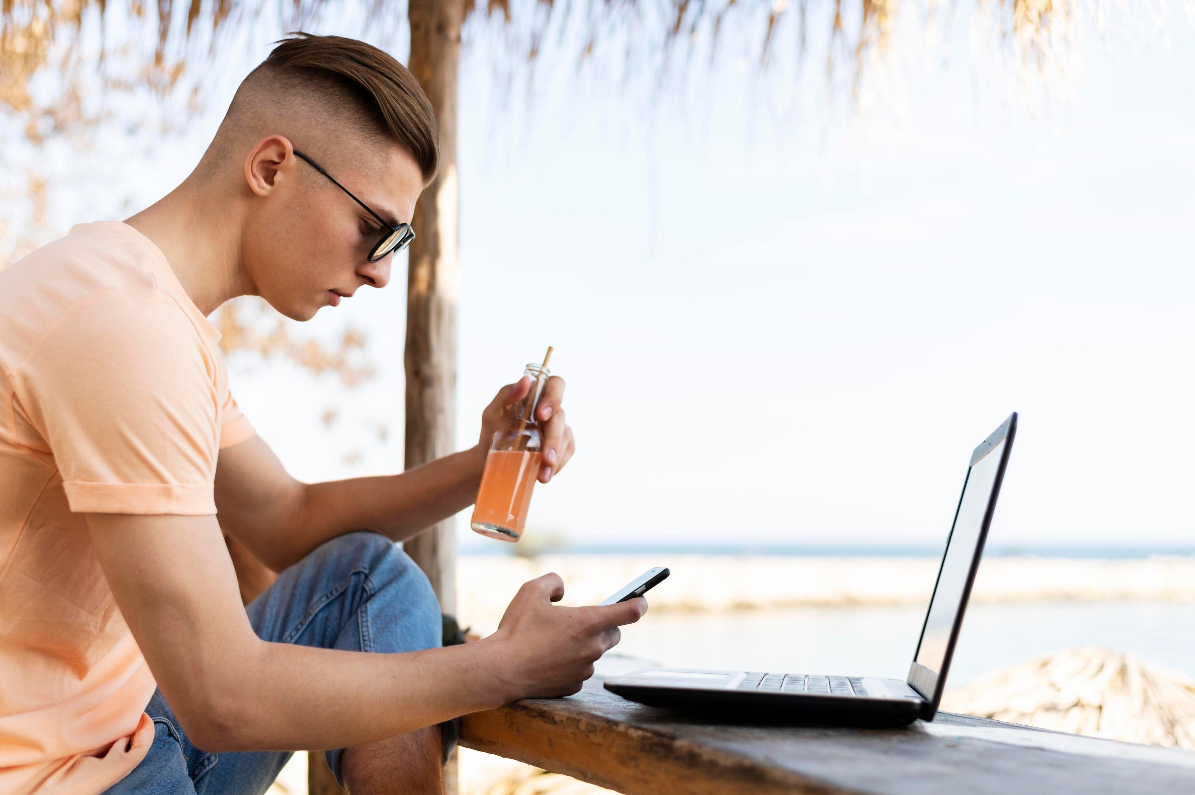 medium-shot-man-outdoors-with-laptop.jpg