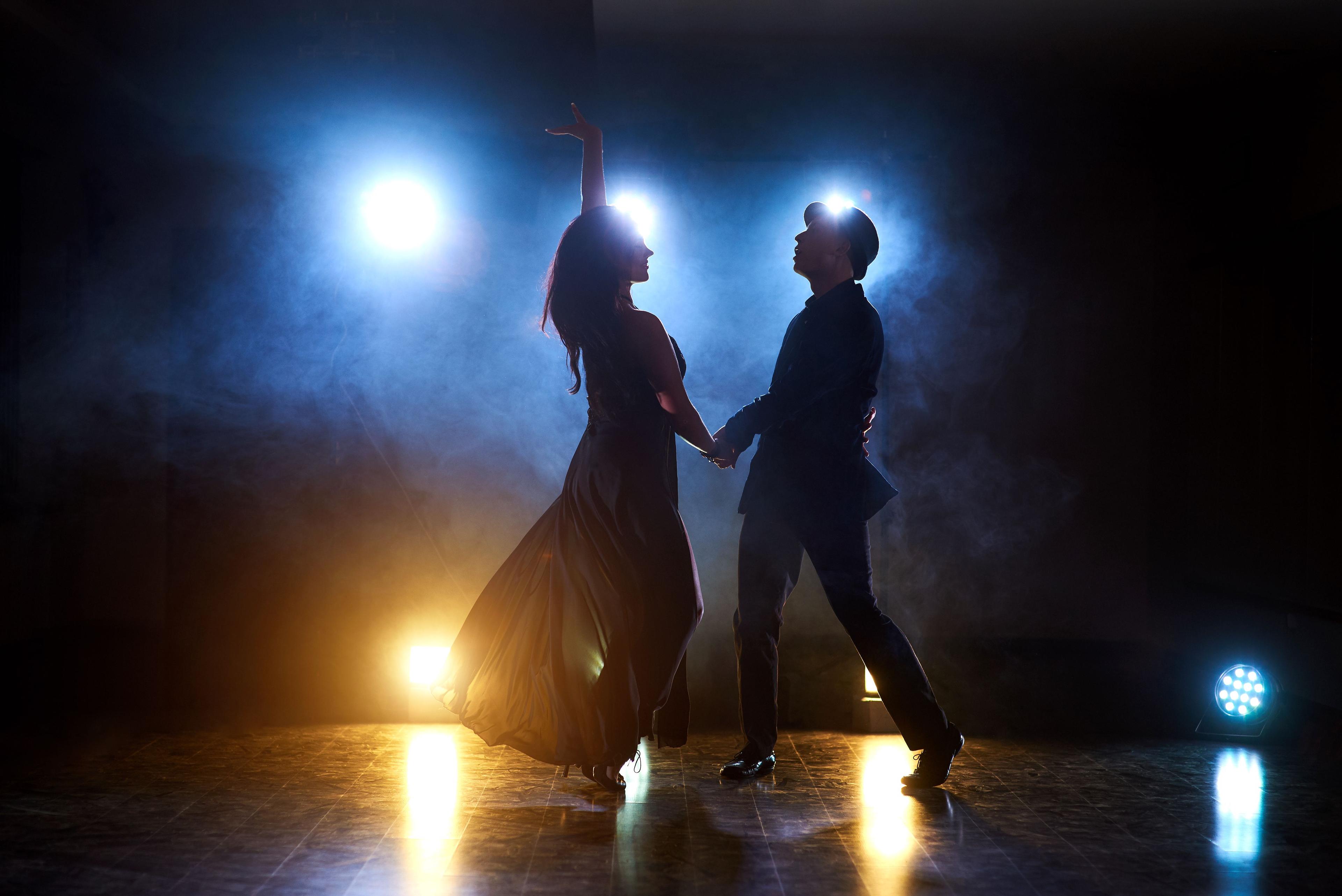 skillful-dancers-performing-dark-room-concert-light-smoke-sensual-couple-performing-artistic-emotional-contemporary-dance.jpg