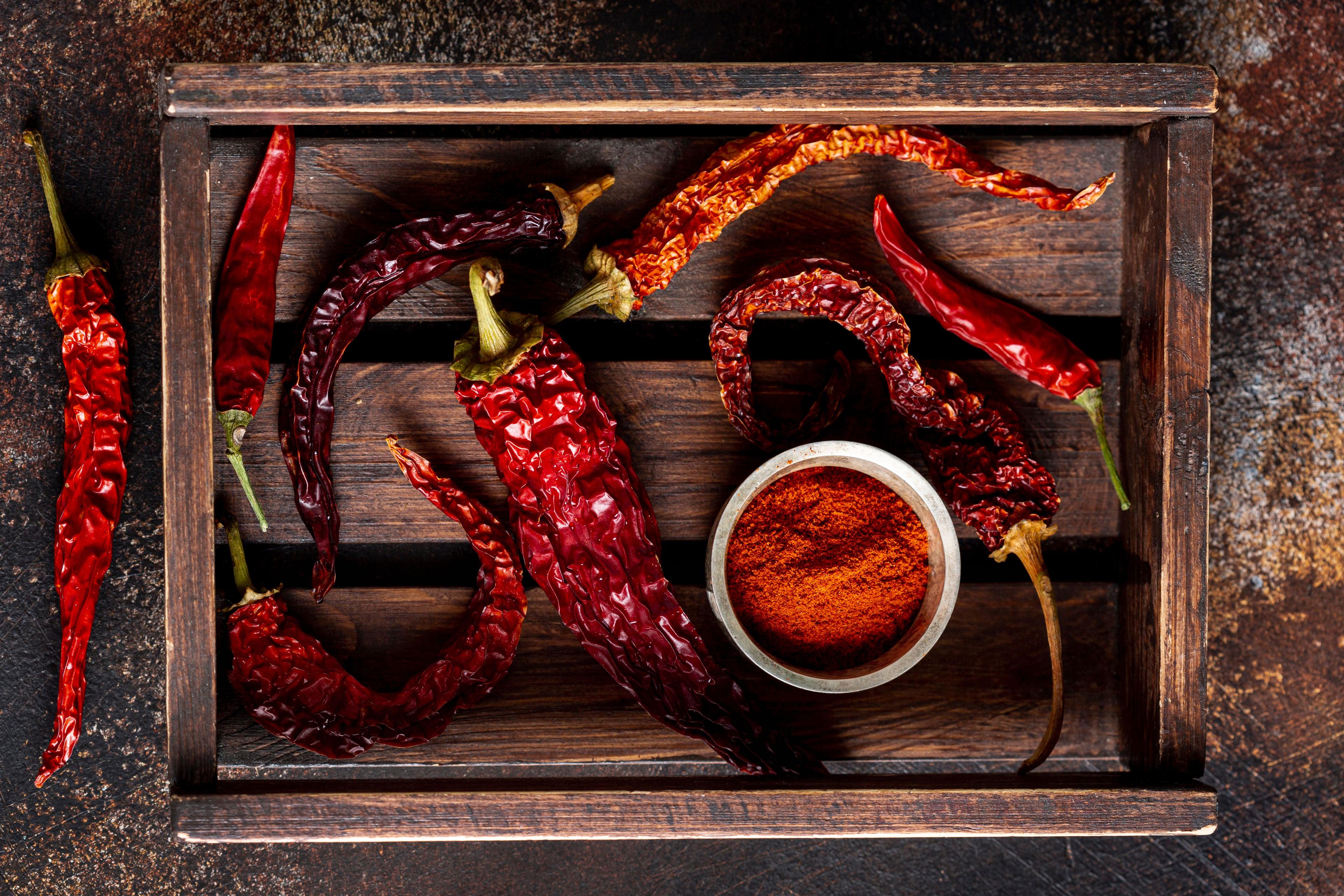 top-view-chili-peppers-wooden-tray (1).jpg